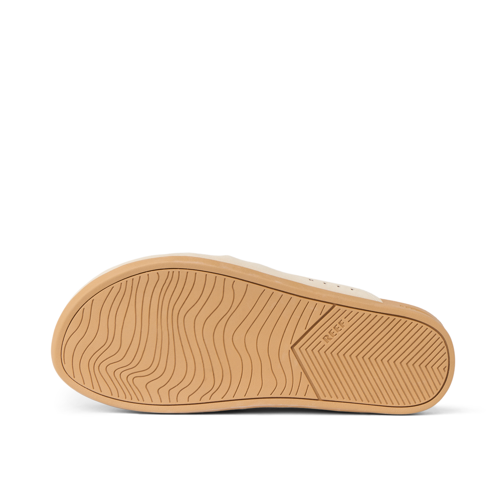 Sole view of Vista Myra in warm sand leather with wave-patterned rubber outsole for grip and durability, facing up.