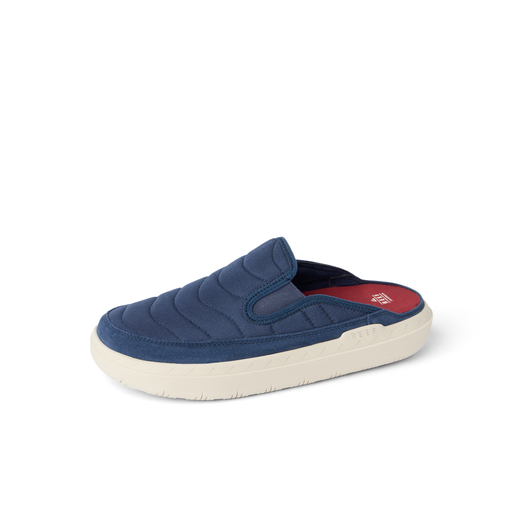 Rambler Kicker mule facing left in navy with cushioned memory foam footbed and lightweight textured EVA sole for everyday comfort