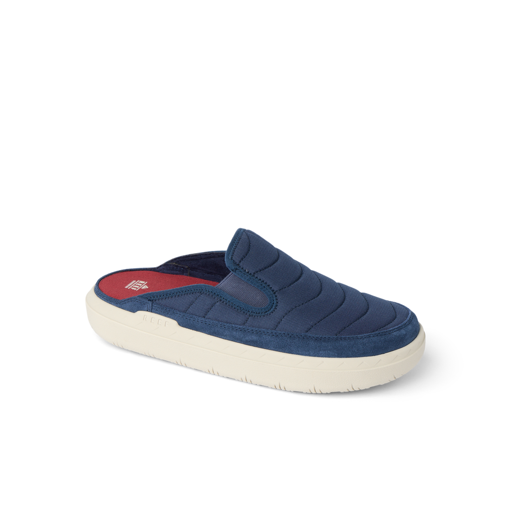 Rambler Kicker mule facing left in navy with cushioned memory foam footbed and lightweight EVA sole for durable comfort