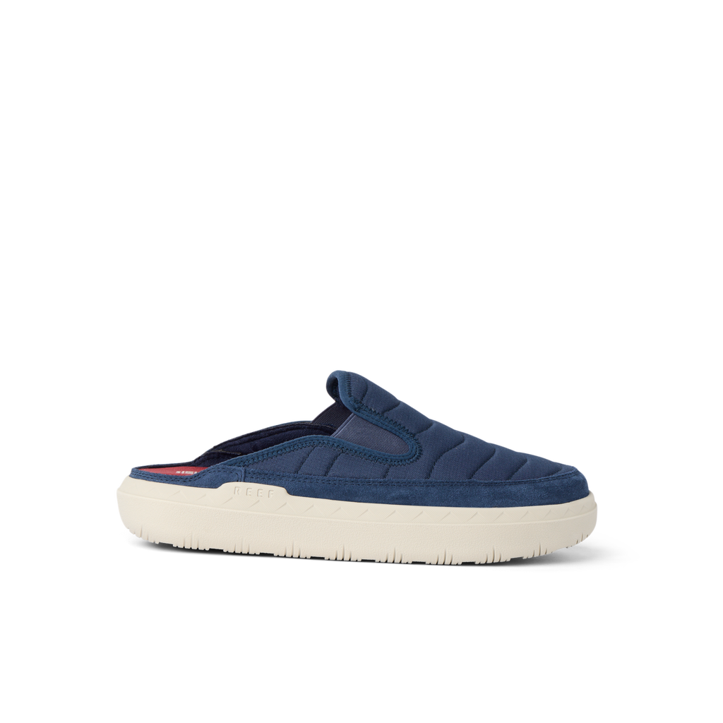 Rambler Kicker mule facing right in navy with cushioned memory foam footbed and lightweight EVA sole for everyday comfort