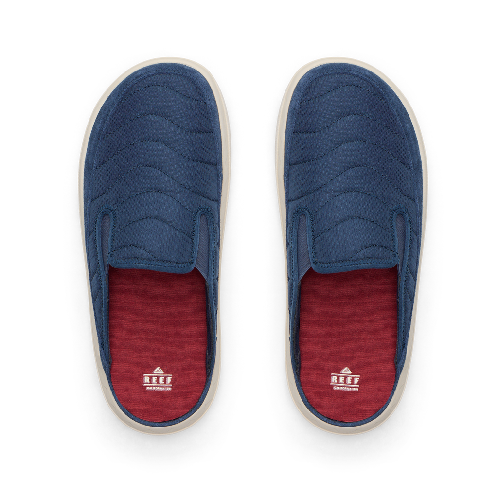 Rambler Kicker top view showing navy soft upper, cushioned memory foam footbed with red lining, and lightweight EVA sole for comfort