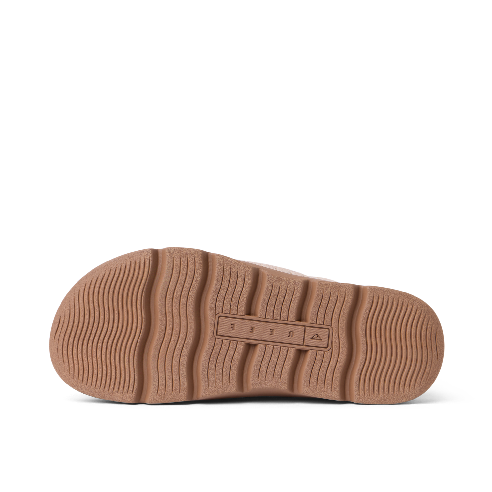 Vista Luxe Mariana outsole facing up, light taupe rubber sole with wave-inspired tread for durable beach-ready traction and comfort