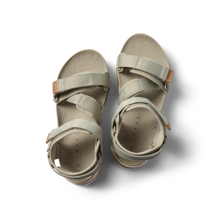 Top view of Cross-Shore men’s sandals in tan with adjustable straps, soft cushioning, and arch support for beach comfort.
