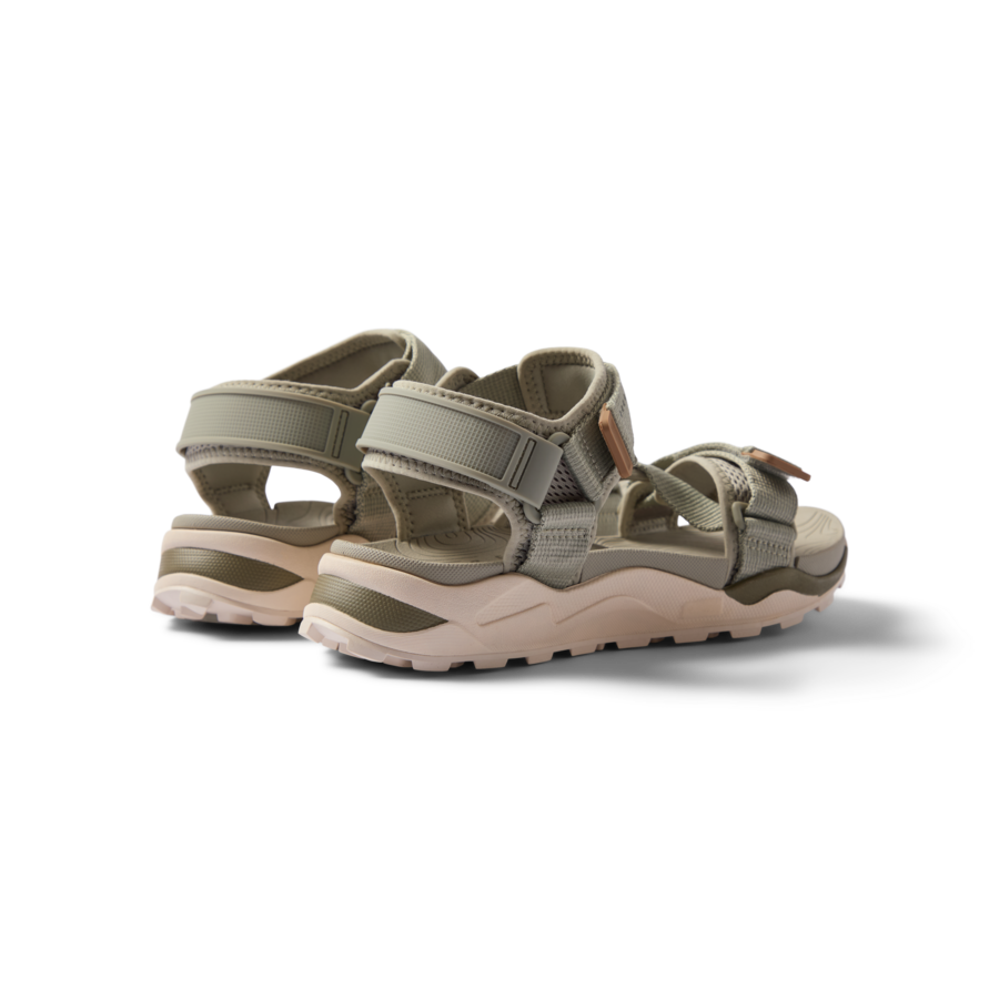 Cross-Shore men's sandals facing backward, showing cushioned heel and surf-inspired durable straps for beach comfort.