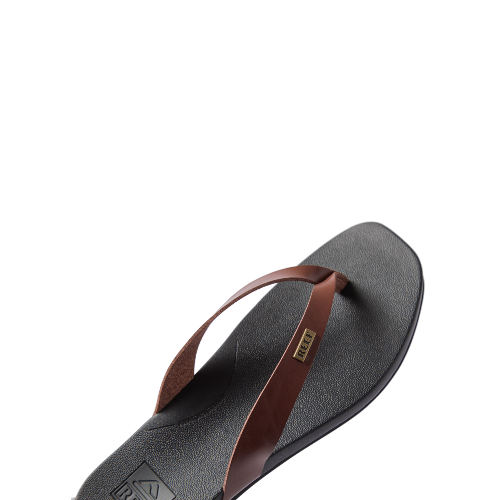 Vista Lune women's sandal facing left, close-up on soft-rebound cushioned footbed with chocolate brown straps for beach comfort.