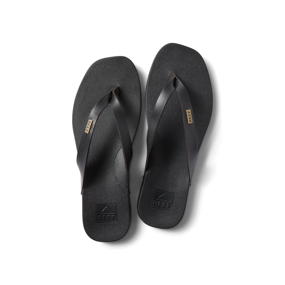 Vista Lune black flip flops top view, showing front straps with anatomical arch support, water-friendly comfort design.