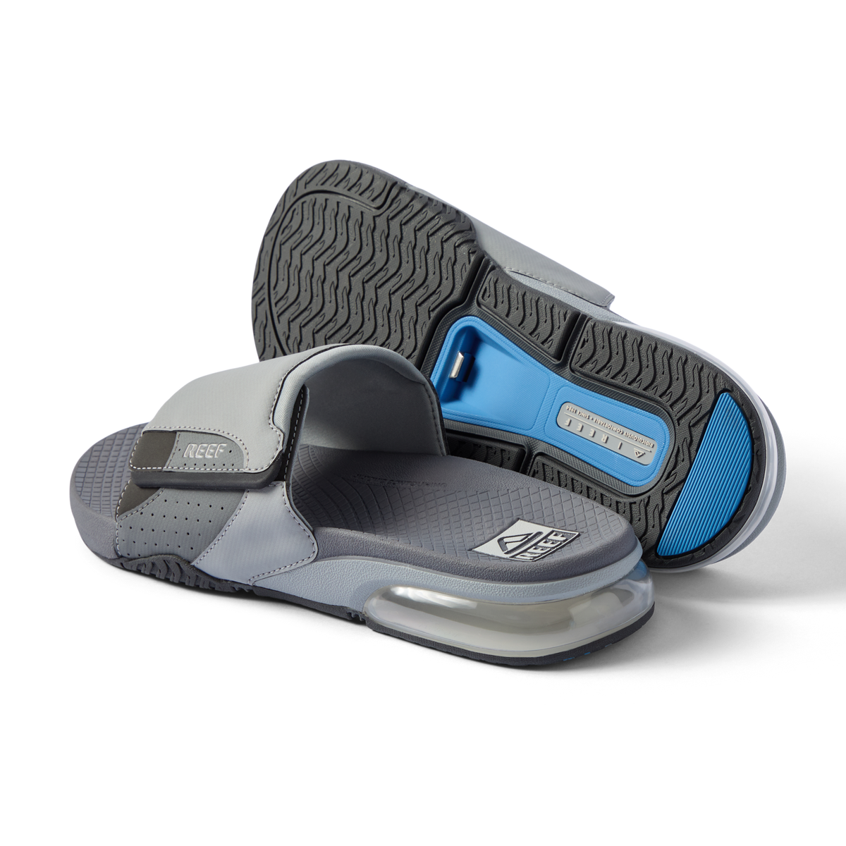 Fanning + Slide sandals facing right with grey water-friendly straps, oversized airbag heel, and anatomically cushioned footbed