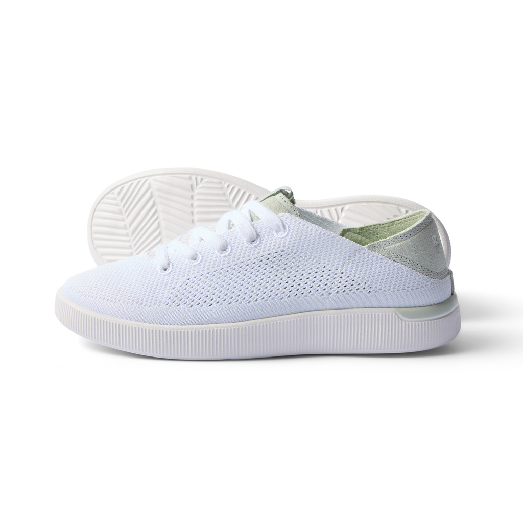 Reef Neptune women's white and dusty sage sneaker facing right, breathable knit upper, cushioned sole, beach-inspired comfort.