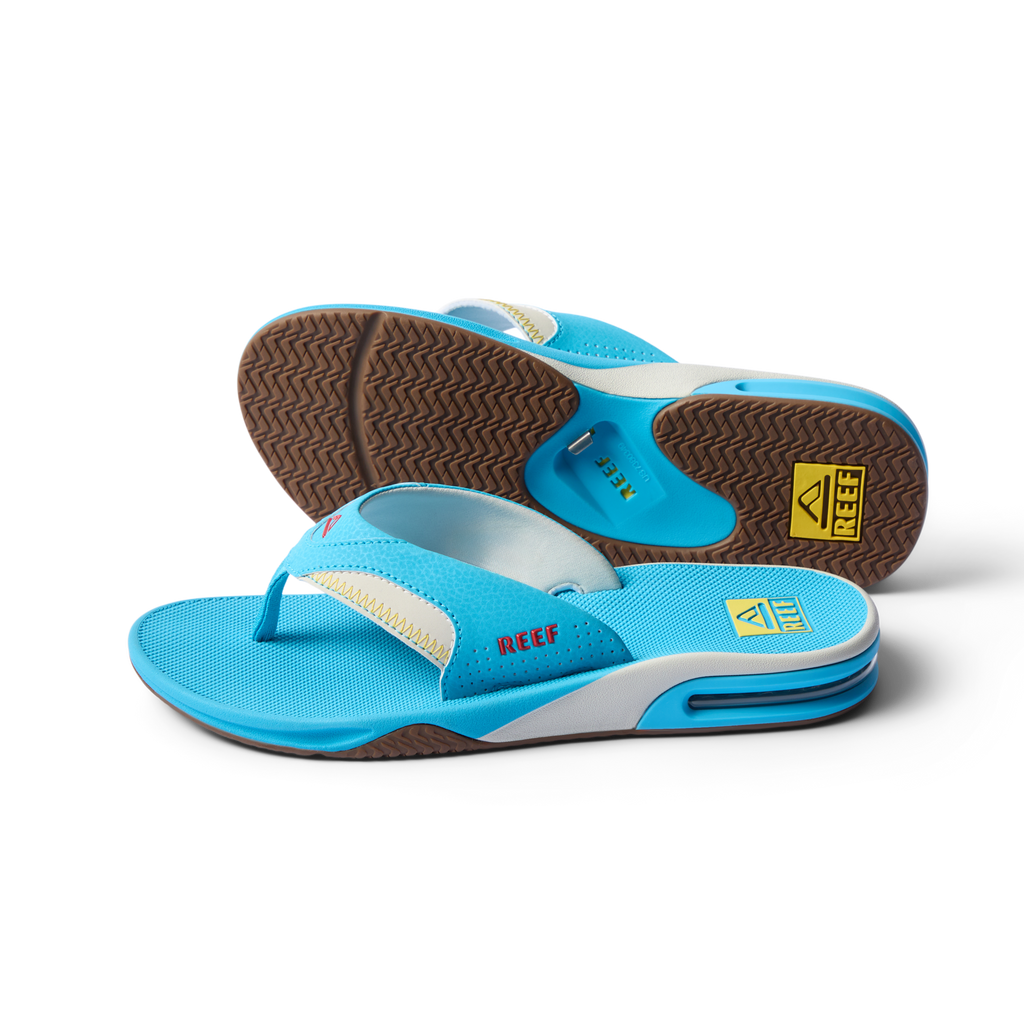 Pair of men’s Fanning sandals in aquamarine, front facing with visible soft-rebound cushioning and arch support soles.