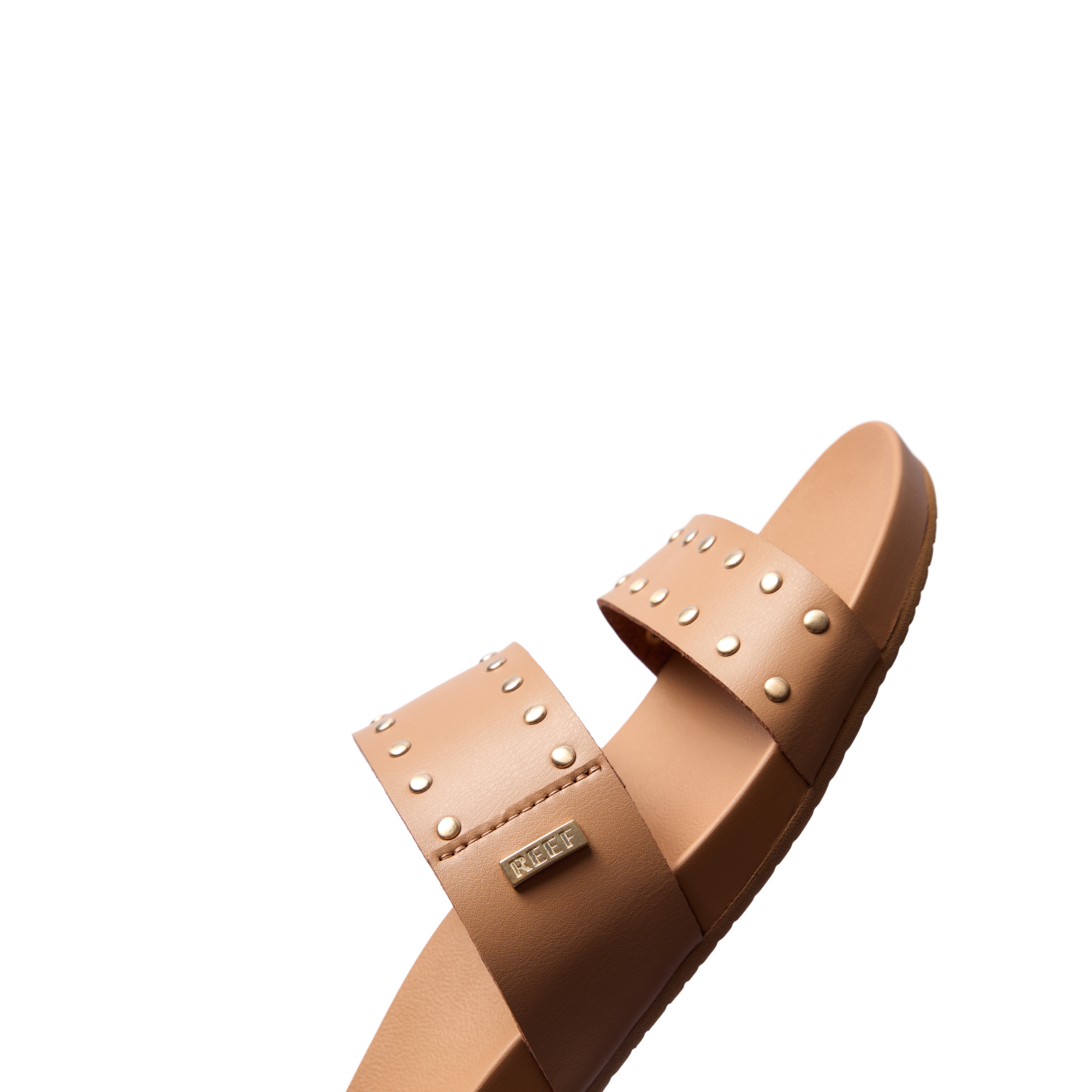 Cushion Vista women's sandal facing right, close-up on soft leather straps with metal studs and arch support design.