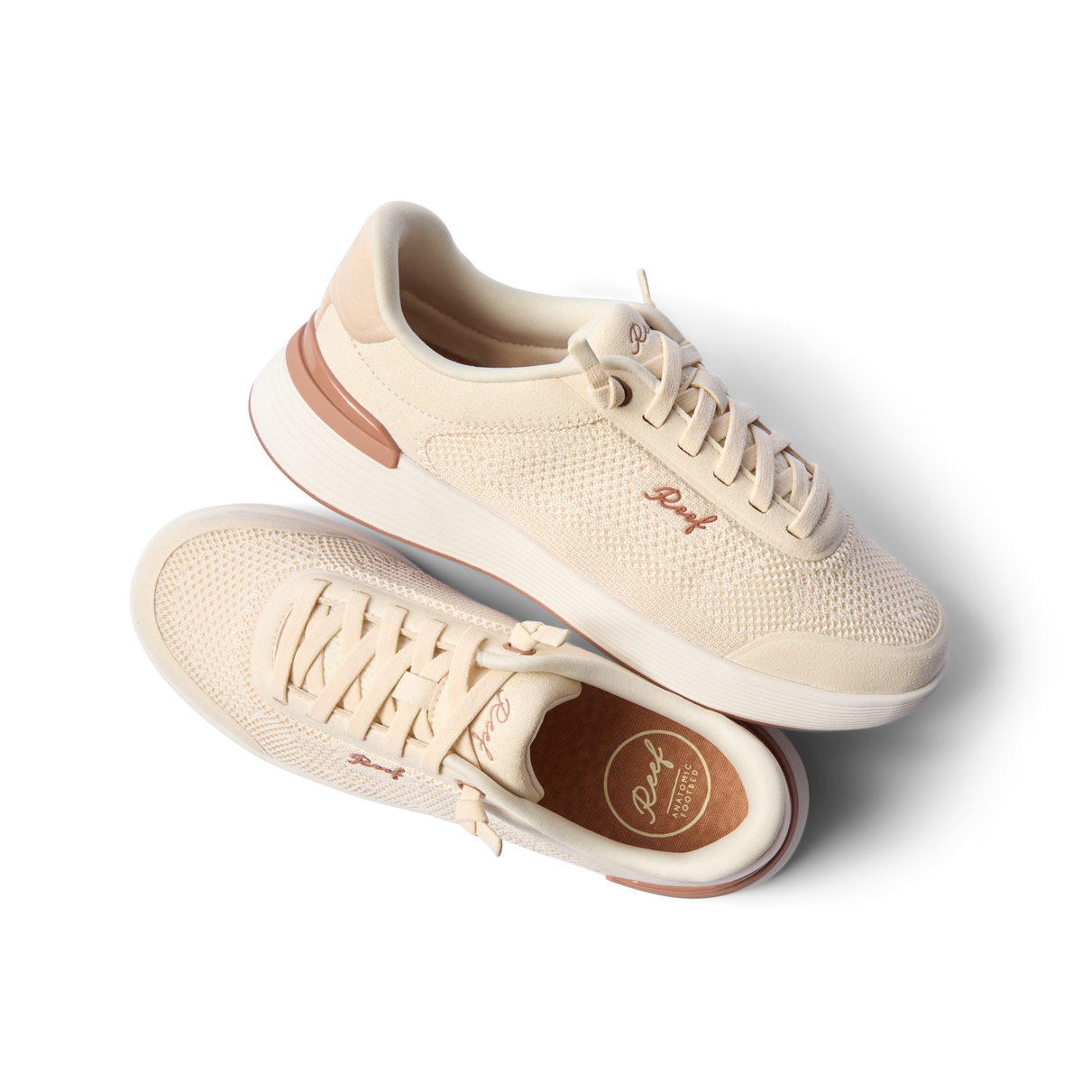 Pair of Shoreline Palisades sneakers in mocha mousse, right shoe facing right, left shoe top view showing arch support insole.