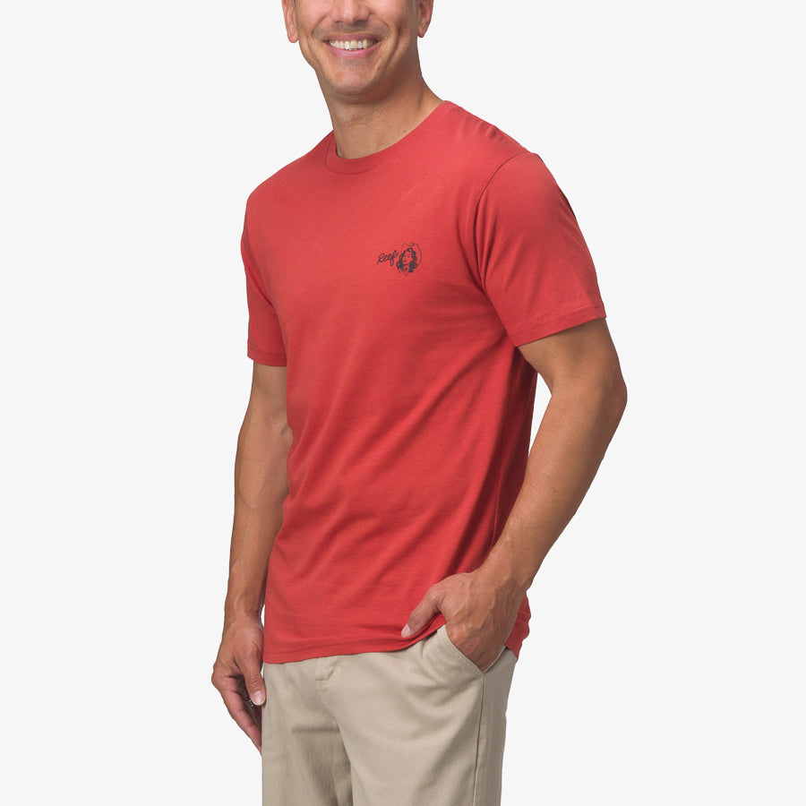 Man wearing a red Cowmaid Tee facing forward with a relaxed fit, highlighting comfort and surf-inspired style.