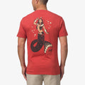 Man wearing red Cowmaid Tee showing back with surf-inspired mermaid graphic for beach comfort style