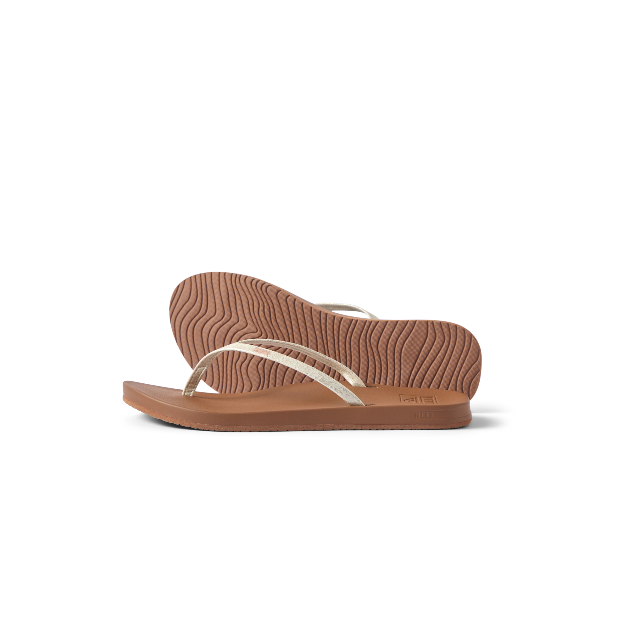 Cushion Slim women's flip flops facing right, side and sole view, featuring surf-inspired cushioning and arch support.