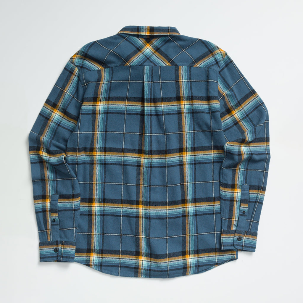 Dyson Flannel Shirt for men shown from back, blue plaid pattern with long sleeves, comfort-focused beach-inspired apparel.