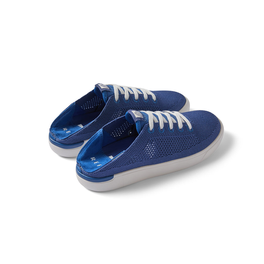 Kids Neptune shoes in navy facing right, showing side and top with breathable mesh and white laces for comfort.