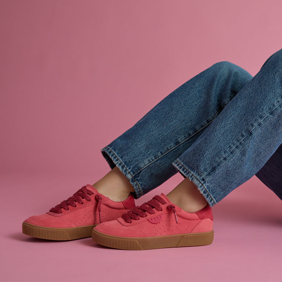 Side view of women's Lay Day Seas sneakers in red with gum soles, showcasing comfort and beach-inspired style.