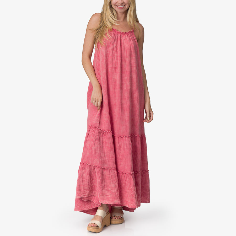 Woman wearing a mauve Lainey Maxi Dress standing with beige platform sandals facing forward, beach-inspired comfort apparel.