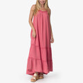 Woman wearing a mauve Lainey Maxi Dress standing with beige platform sandals facing forward, beach-inspired comfort apparel.