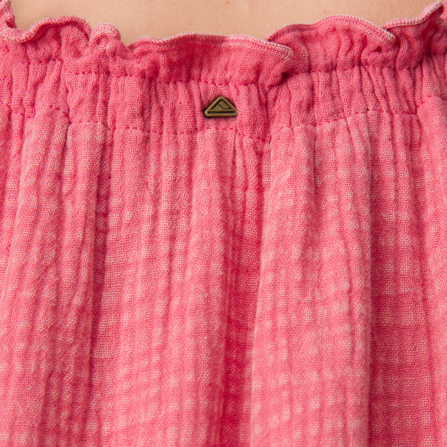Close-up of mauve textured fabric detail on the Lainey Maxi Dress, highlighting its soft, beach-inspired comfort design.