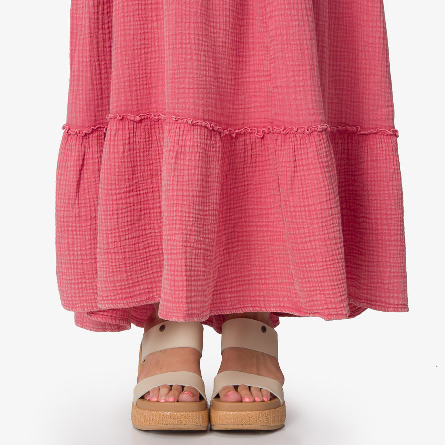 Model wearing Lainey Maxi Dress in mauve wood wash with front-facing beige sandals featuring arch support and cushioning.