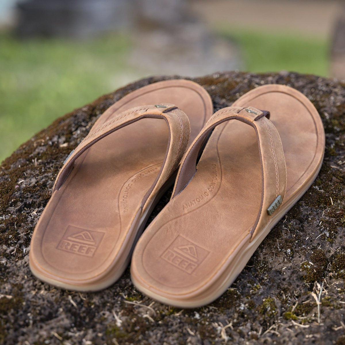 Pair of Leather Offshore men's sandals facing up, close-up on footbed showing soft cushioning and arch support.
