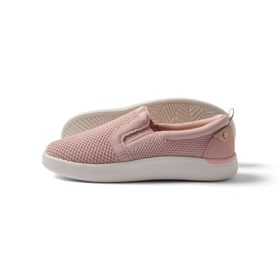 Neptune Elyse women's pink slip-on sneaker facing left with breathable mesh, cushioning, and arch support for beach comfort.