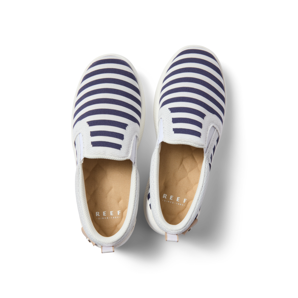 Top view of Neptune Elyse women's slip-on sneakers in navy and white stripes with anatomical arch support and cushioning.