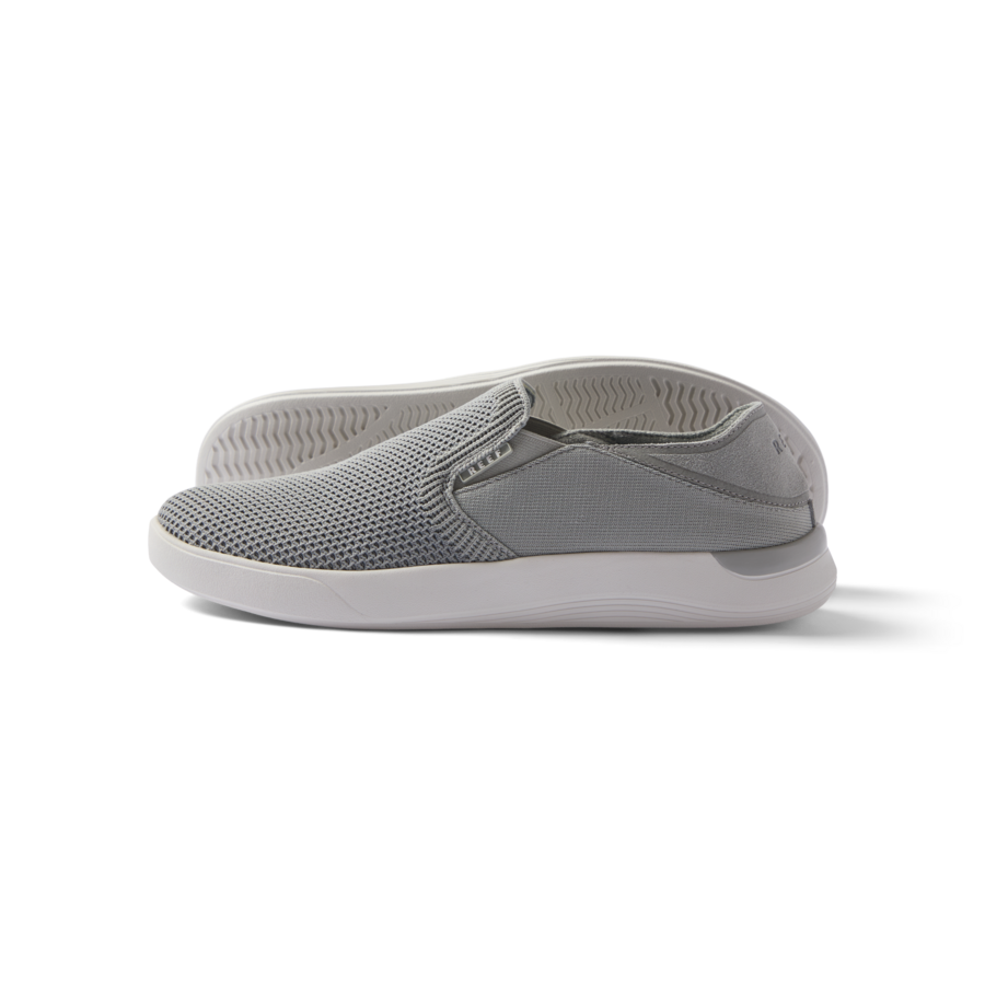 Neptune Slip-On men's grey slip-on shoe facing left, close-up side view with breathable mesh upper and cushioned sole.