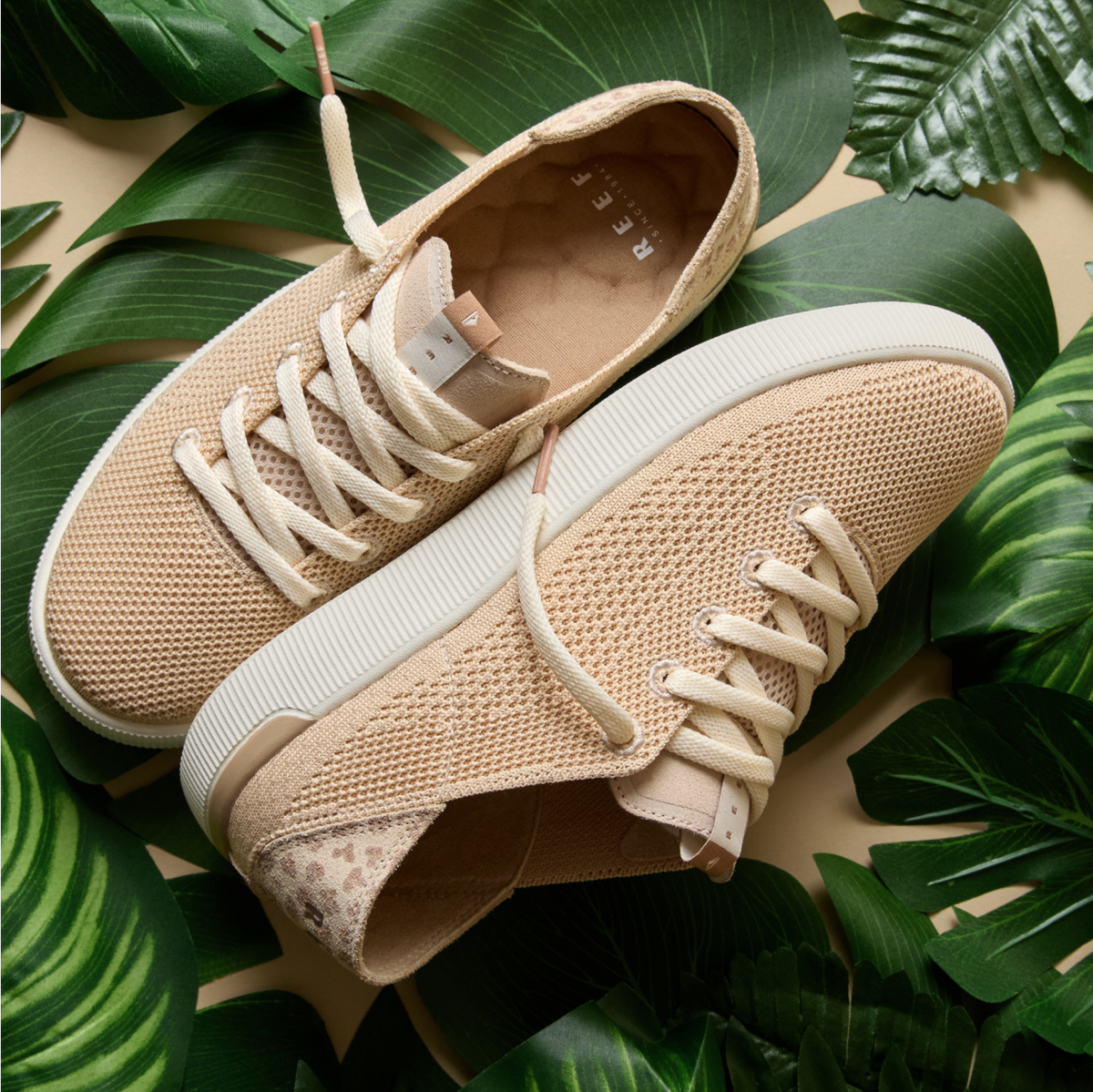 Reef Neptune women's sneakers in neutral beige, top and side view, featuring lightweight knit and soft cushioning, beach-inspired comfort.