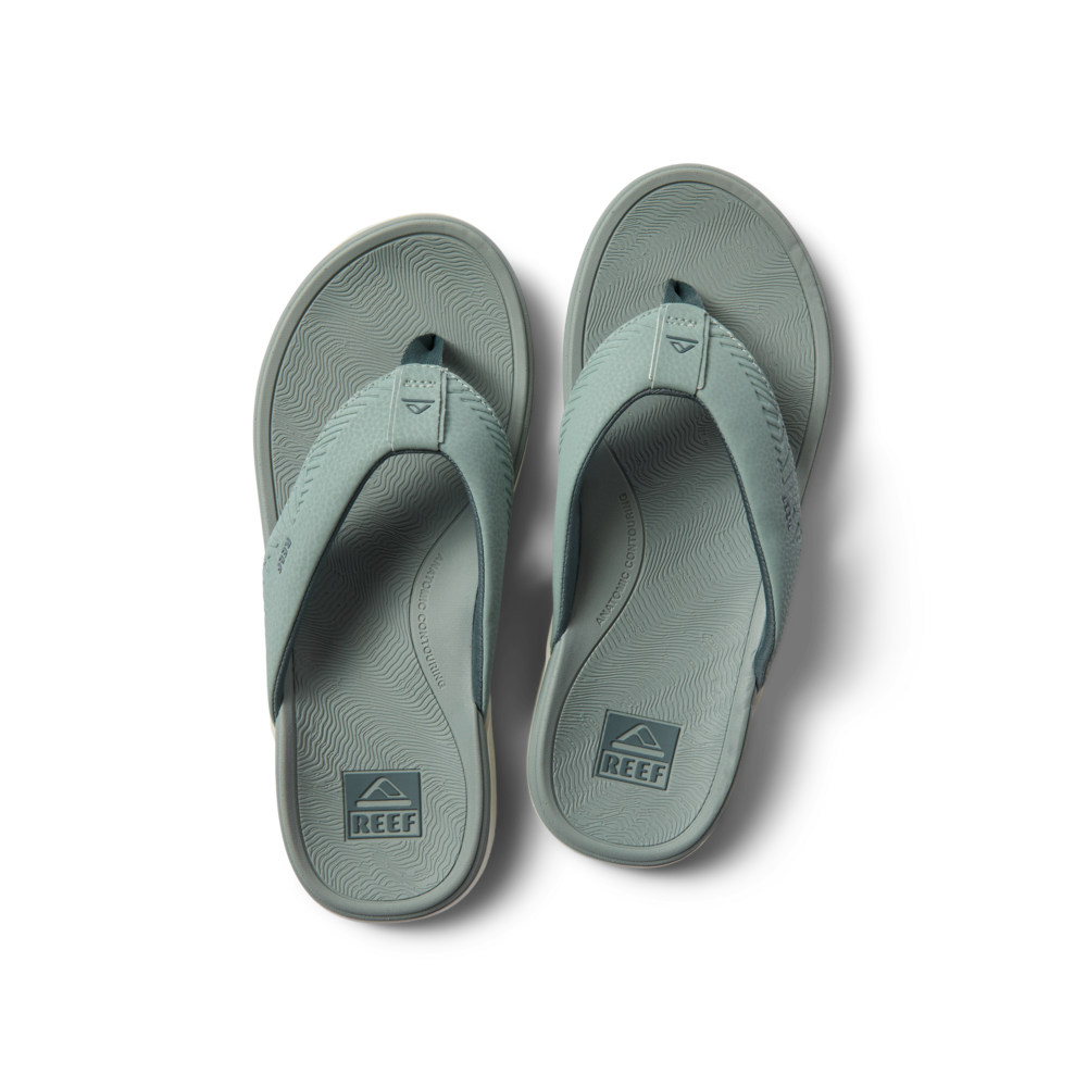 Top view of Offshore men's flip flop sandals in muted green with soft-rebound cushioning and arch support by REEF.