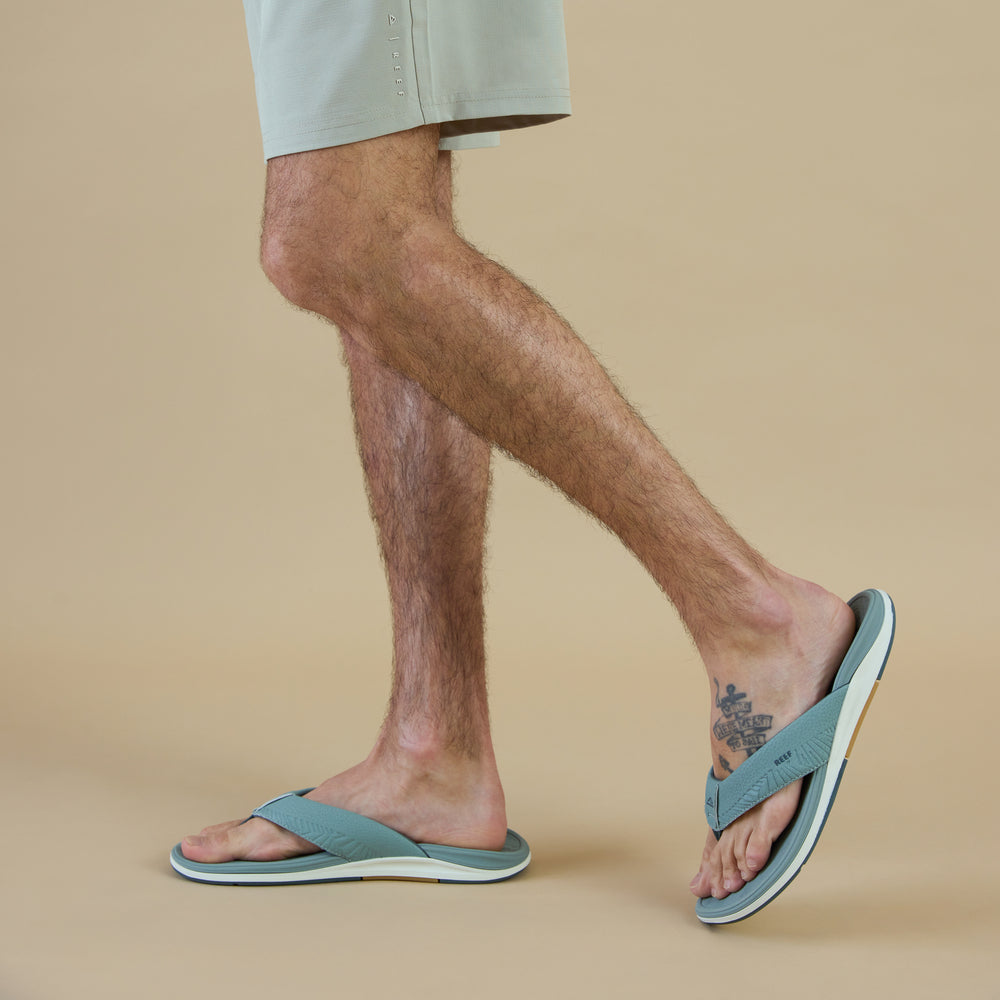Offshore men's sandals facing right, side view, showing footbed and soft-rebound cushioning, beach-inspired comfort and support.