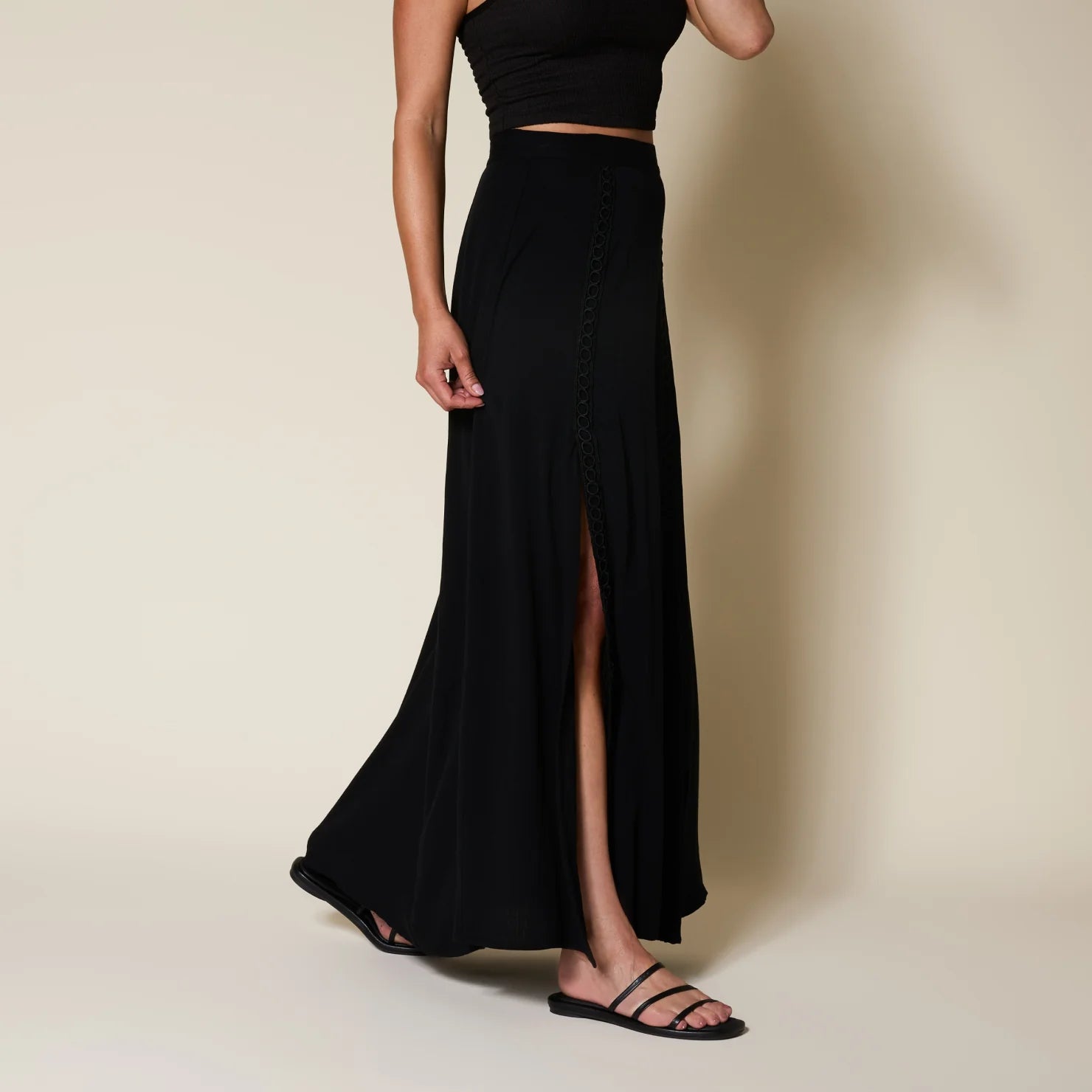 Willow Ava black women's sandals side view with minimalist straps, beach-inspired comfort and arch support design.