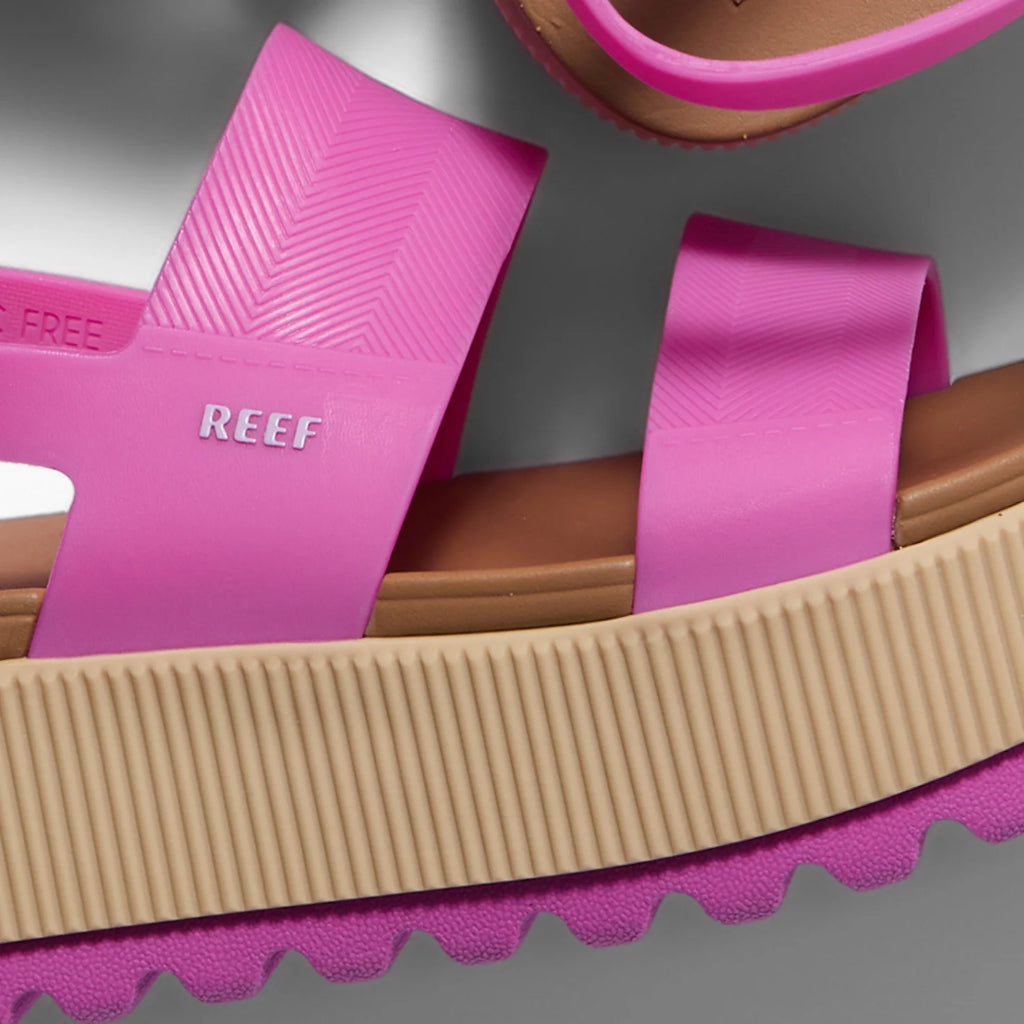 Close-up of the pink Water Vista Higher sandal’s right side, showing straps, molded footbed, and ribbed platform sole for comfort.