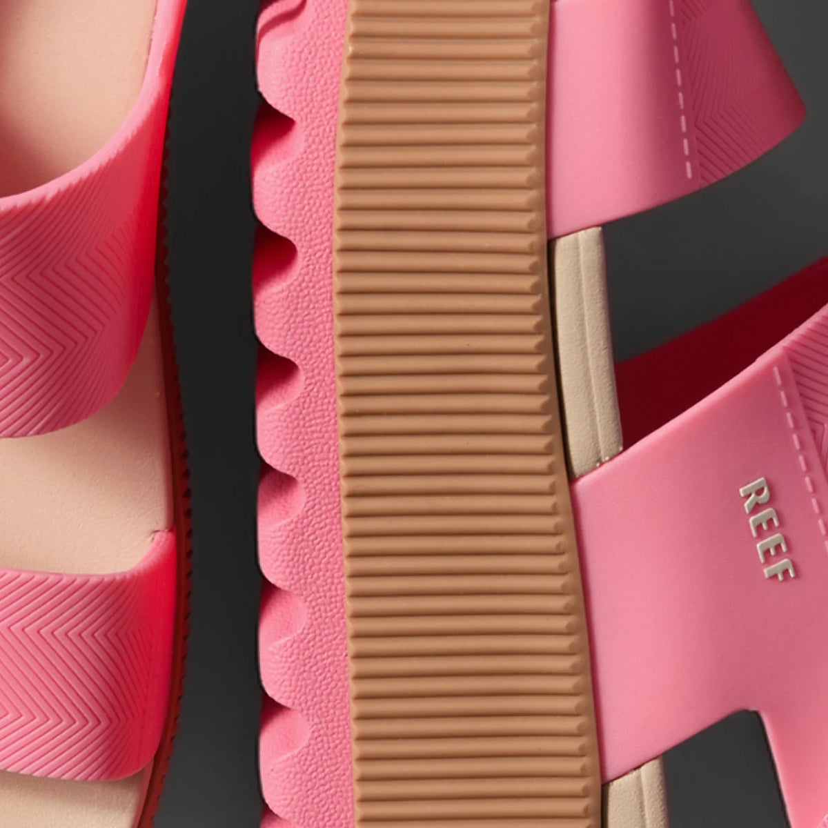 Close-up of the side and sole of pink Water Vista Higher women's sandals facing right with arch support and cushioning.