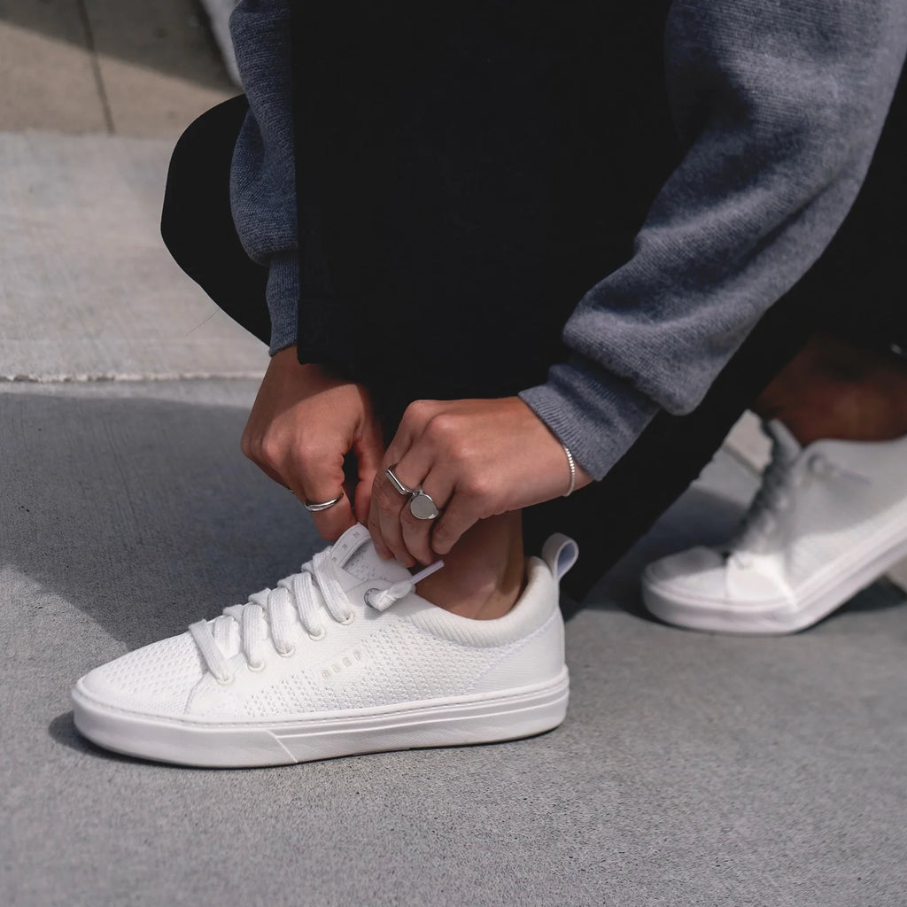 Close-up of the left Lay Day Lite sneaker facing left, highlighting lightweight, beach-inspired comfort and support.