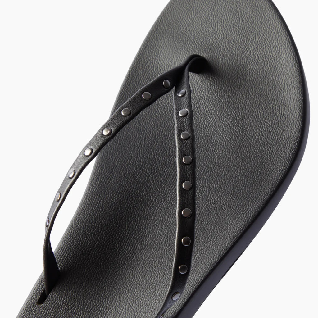 Top view of black Cushion Slim Studs sandal for women with studded straps and comfort cushioning for beachwear.