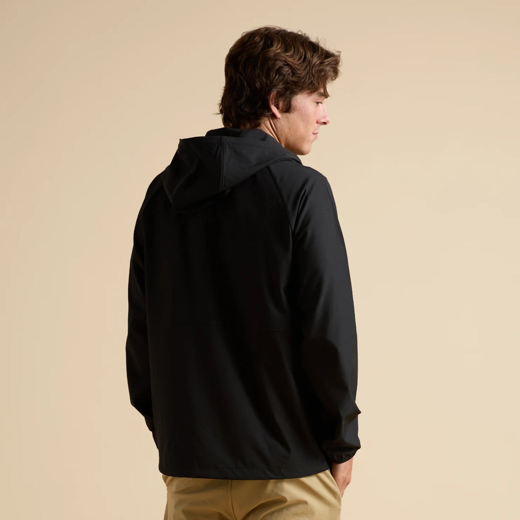 Garvey Full Zip Jacket shown from back on male model, highlighting lightweight, comfortable, surf-inspired men’s apparel.