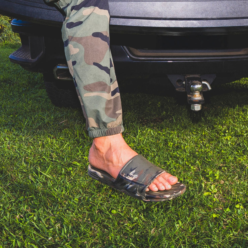 Fanning Slide H2O on a left foot facing right, showing top and side view with water-friendly soft-cushioned footbed.