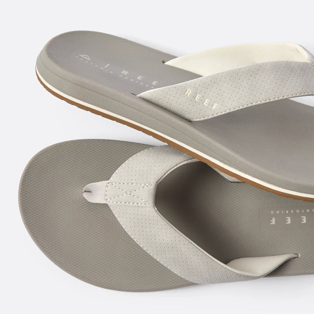 Top view close-up of the Nox men's flip flops in greige with soft-rebound cushioning and arch support facing right