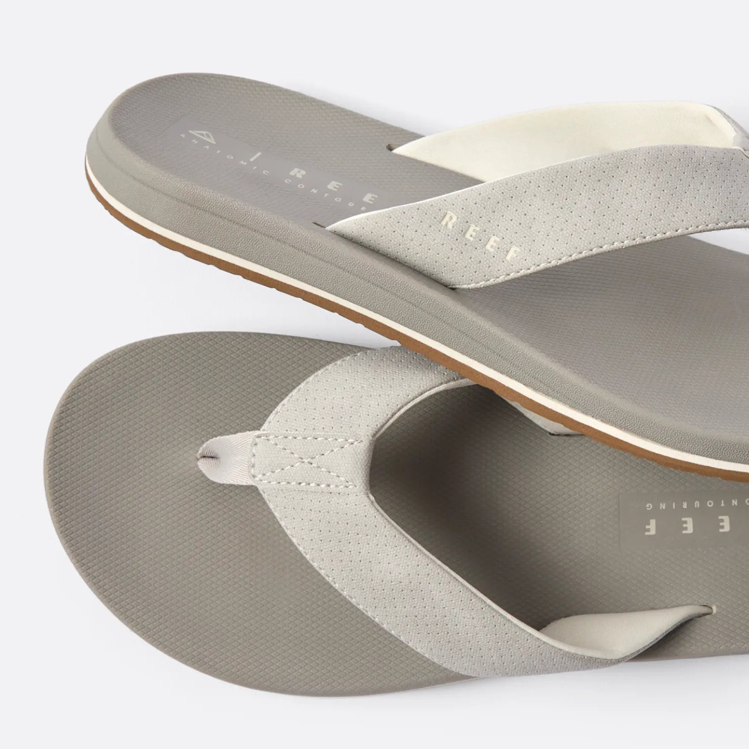 Top view close-up of the Nox men's flip flops in greige with soft-rebound cushioning and arch support facing right