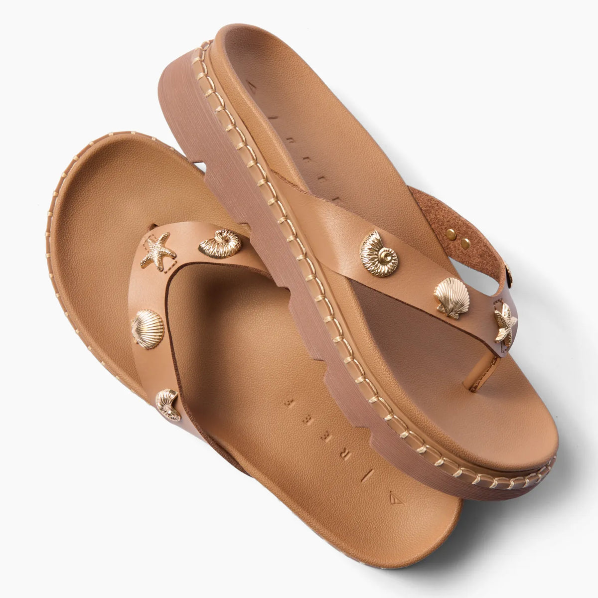 Vista Luxe Vivianahh tan sandals facing left with shell accents, ridged sole, and cushioned arch support for beach comfort.