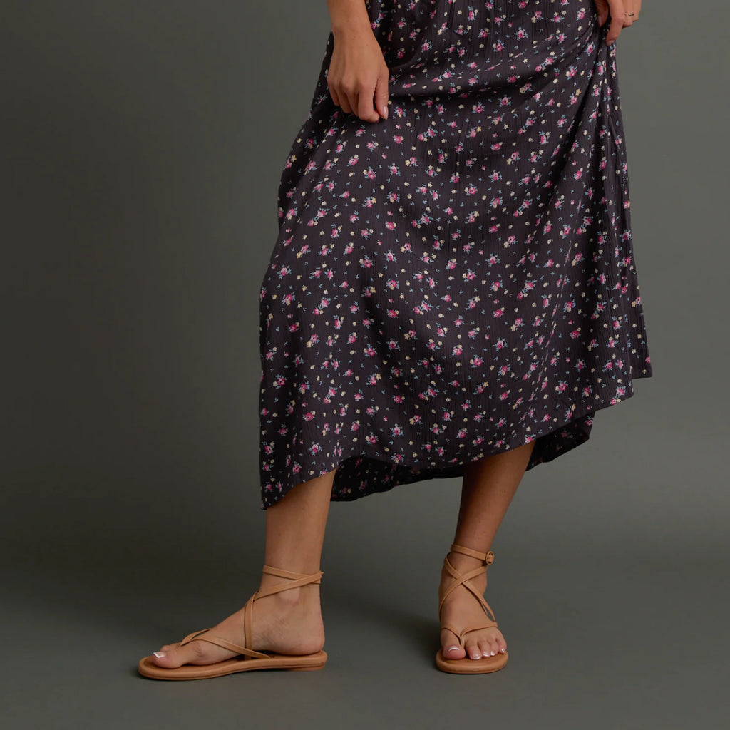 Willow Quinn sandals facing forward on woman’s feet with ankle straps, showcasing comfort and beach-inspired design.