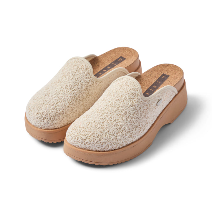 Vista Skye women's slip-on clogs facing forward, featuring breathable lace upper and cushioned platform sole for comfort.