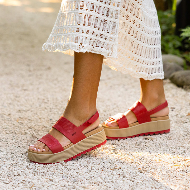 Water Vista Higher women's red platform sandals facing right, showing front and side, beach-inspired and comfort-focused design.