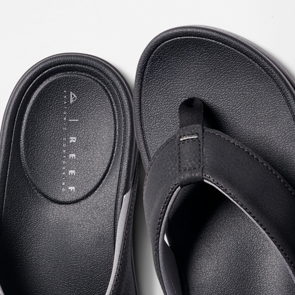 Close-up of the top view of the black Phantom Bonzer men's sandal facing upward with comfort cushioning and arch support.