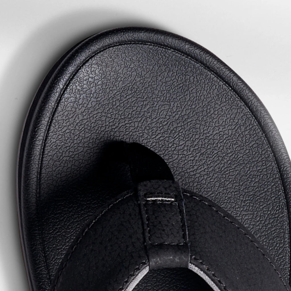 Close-up of the front toe area of the Phantom Bonzer men's black sandal, designed for beach comfort and durability.