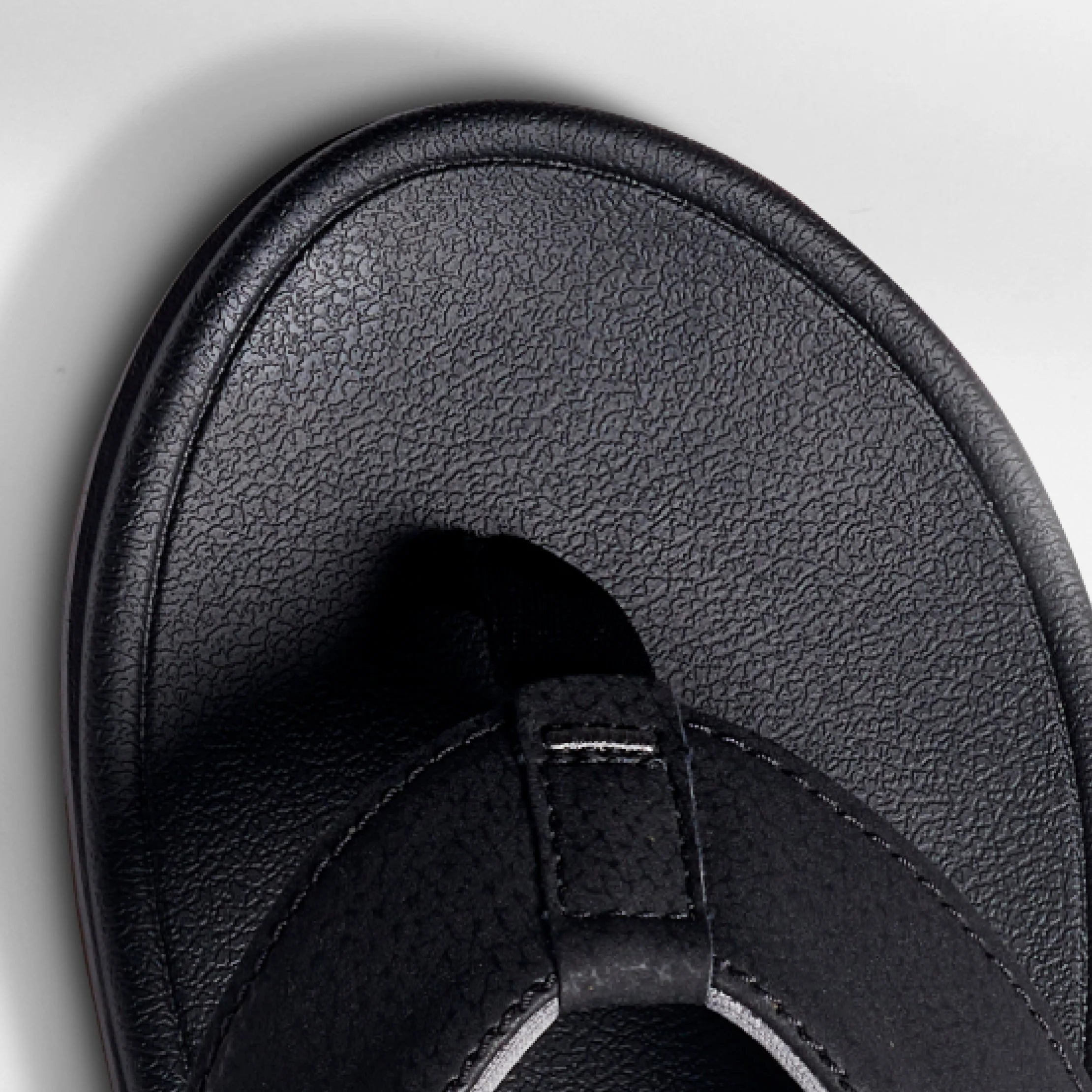 Close-up of the front toe area of the Phantom Bonzer men's black sandal, designed for beach comfort and durability.