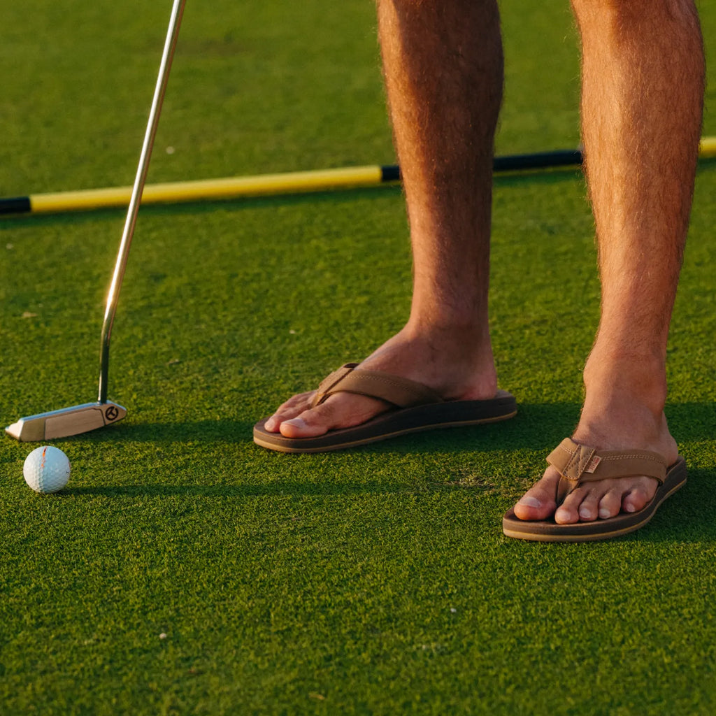 Free Fly X Ojai men's brown leather sandal facing right, close-up on footbed with soft-rebound cushioning and arch support