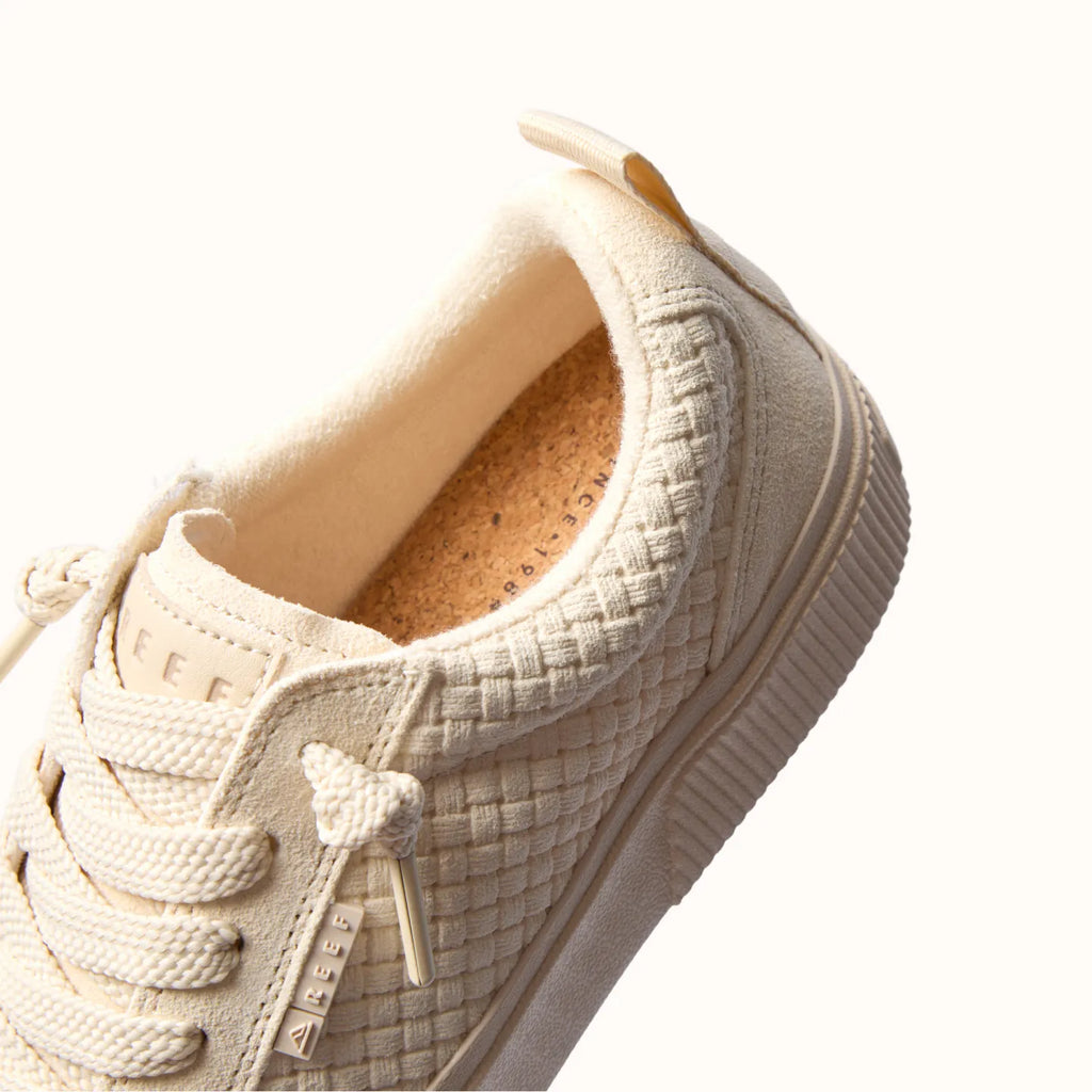 Lay Day Dawn x Jenny sneaker close-up showing heel and cushioned footbed with ergonomic arch support, surf-inspired comfort